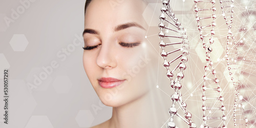 Quadro su tela Beautiful sensual woman and glass DNA stems over beige background
