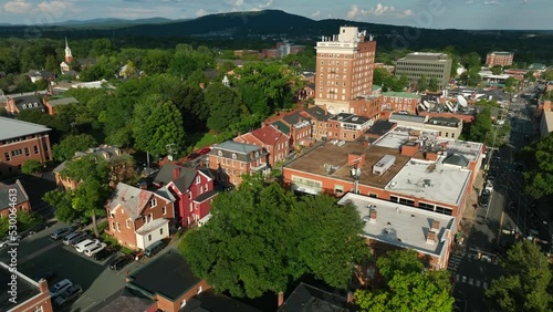 Historic downtown Charlottesville Virginia during summer golden hour. Aerial establishing shot. photo