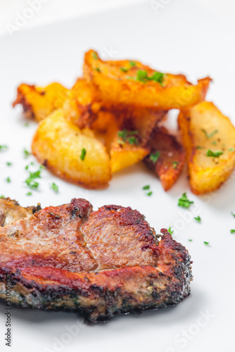 pork steak with fried potatoes