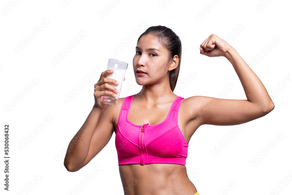 Shot of smiling young sporty Asian woman fitness model in pink-top sportswear showing hand biceps muscles and holding milk. isolated on white background. Fitness and healthy lifestyle concept. Shot of smiling young sporty Asian woman fitness model in pink-top sportswear showing hand biceps muscles and holding milk. isolated on white background. Fitness and healthy lifestyle concept.