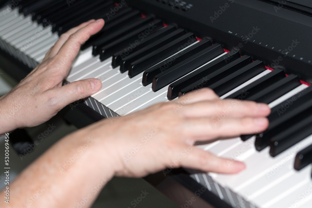 hands playing piano hands playing piano