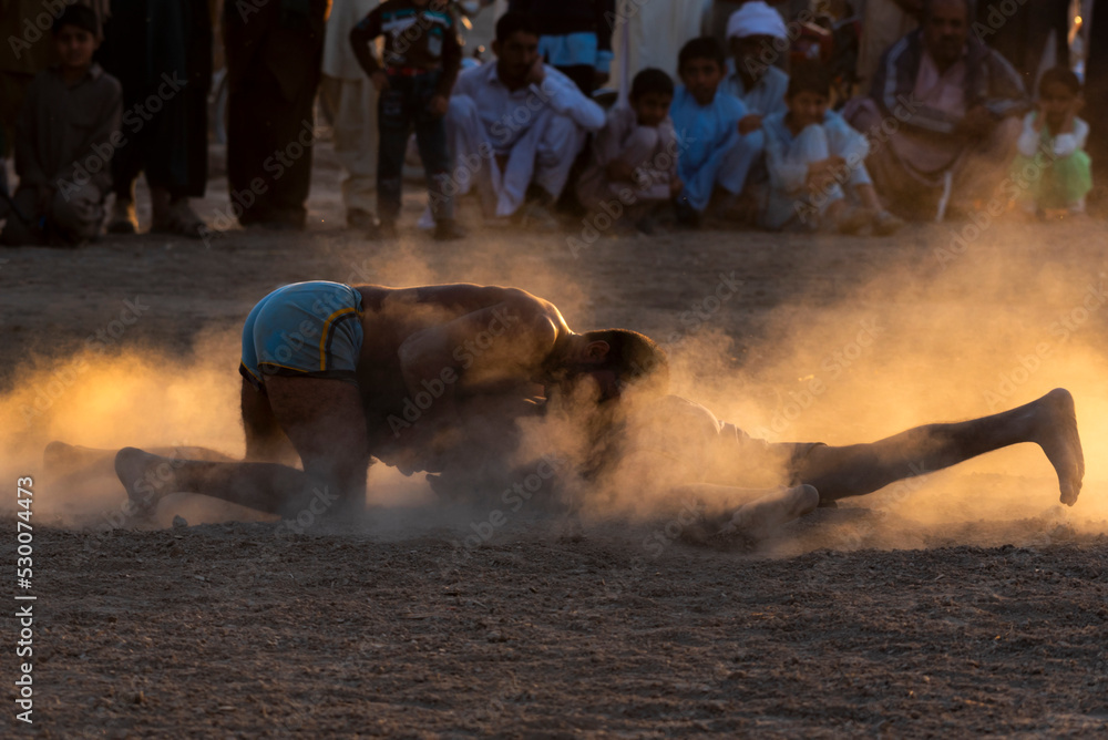 people of rural areas of punjab are playing a traditional wrestling