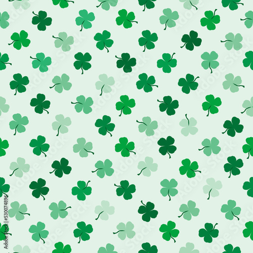 Seamless background with lucky clovers