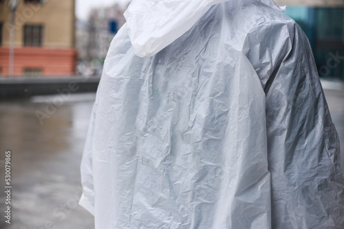Raincoat on a man, shooting outside