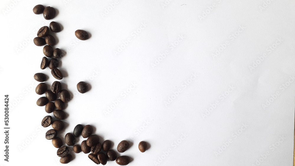 Coffee beans isolated on a white background with copy space for writing text Coffee beans isolated on a white background with copy space for writing text