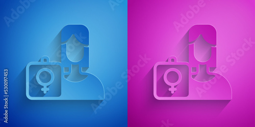 Paper cut Female movement, feminist activist with banner and placards icon isolated on blue and purple background. Feminist rights movement, feminism sisterhood. Paper art style. Vector