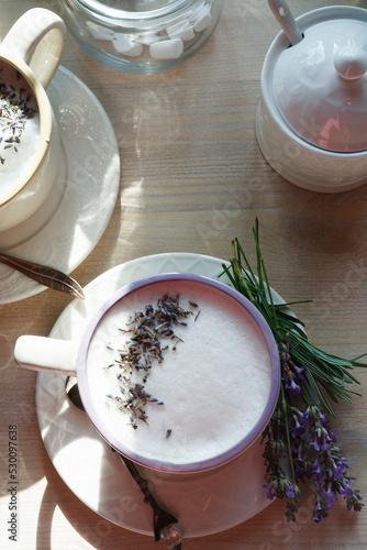 Photography A cup of home made london fog tea latte drink with lavender flower buds, good morning concept, flat lay