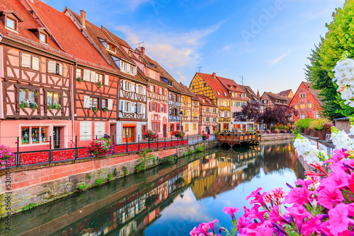 Colmar, Alsace, France. Petite Venice, water canal and traditional half timbered houses.