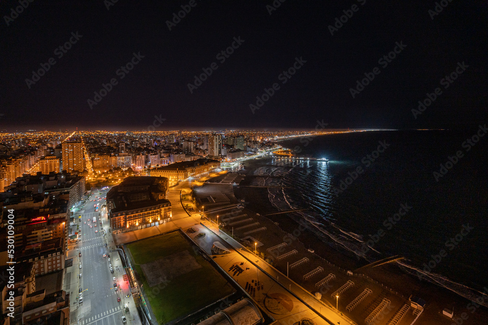 View from the 38th floor of the Havana building in the city of Mar del Plata. Night view of the Hotel Provincial and beach.