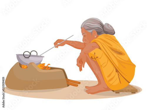 Indian Old Woman Making Or Cooking Food In an Ancient Or Old Kitchen