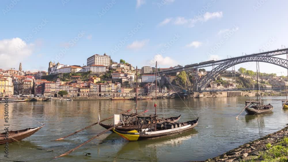 Porto Portugal time lapse 4K, city skyline timelapse at Porto Ribeira and Douro River with Rabelo wine boat Porto Portugal time lapse 4K, city skyline timelapse at Porto Ribeira and Douro River with Rabelo wine boat
