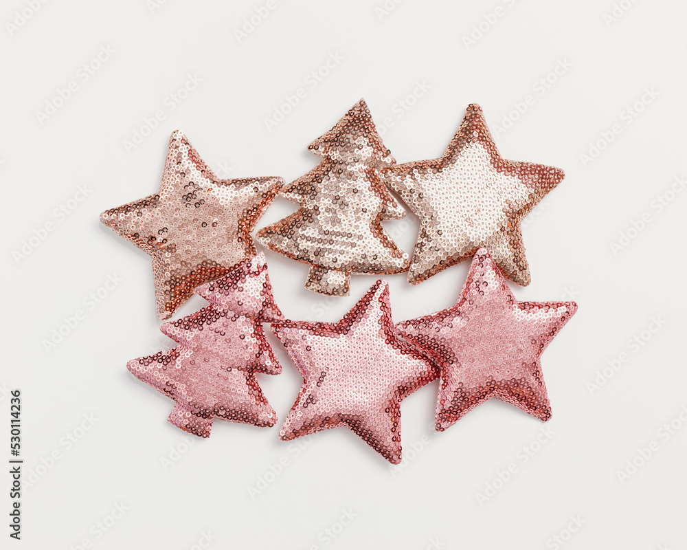 Christmas layout with shining Christmas trees and stars. New Year holiday decorations as aesthetic square pattern. Happy holidays background, trend sparkling xmas toys from metallic sequins Christmas layout with shining Christmas trees and stars. New Year holiday decorations as aesthetic square pattern. Happy holidays background, trend sparkling xmas toys from metallic sequins