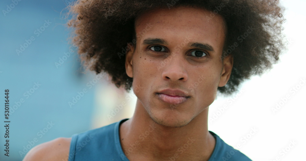 Mixed race handsome young man with serious expression Mixed race handsome young man with serious expression