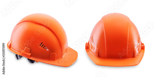 Orange plastic helmet on a white isolated background photo