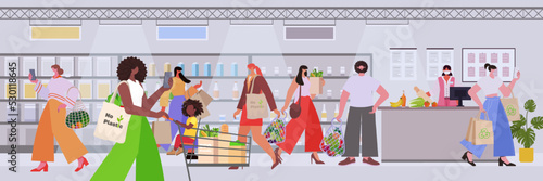 people holding eco friendly natural bags with organic fruits and vegetables in supermarket package free food shopping