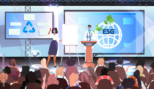 researchers giving speech from tribune sustainable ESG development responsibility of co2 emission environmental conservation