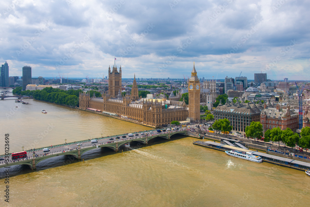 Big Ben, the Palace of Westminster and Westminster Bridge over River Thames aerial view in London, England, UK. The Big Ben and Palace is UNESCO World Heritage Site since 1970. 