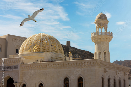 Muscat, Oman. Mosque building architecture and seagull