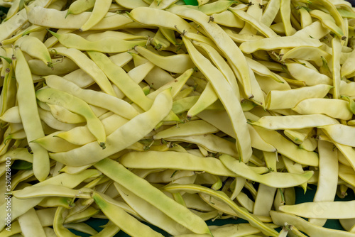 Pile of wax beans at Ljubljana Central Market in Slovenia. Butter or yellow beans in staple food