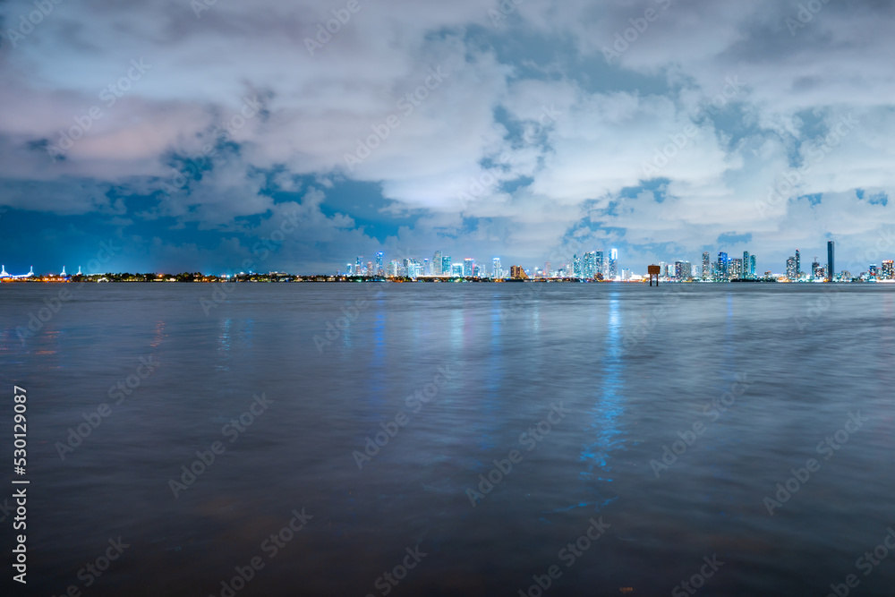 Miami at sunset. Miami Florida, colorful skyline of Macarthur causeway.