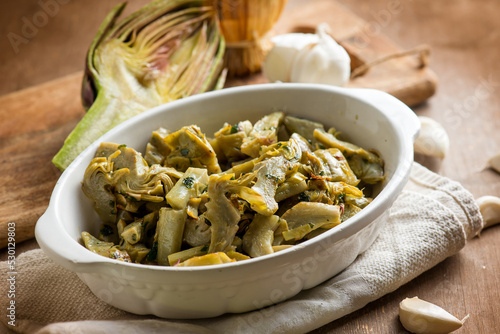 artichoke with olive oil garlic and parsley #530129803
