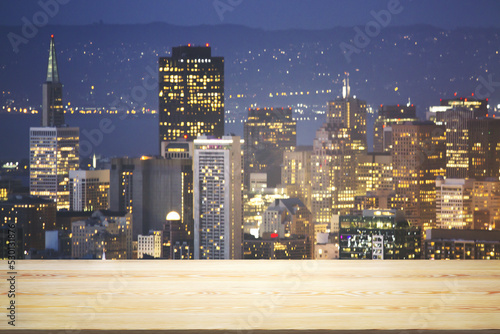 Blank tabletop made of wooden planks with beautiful San Francisco cityscape at evening on background  mockup