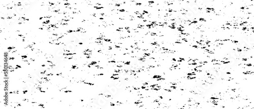 Small uneven spots and particles of debris. Abstract vector texture. Distressed uneven background. Grunge   with fine grains isolated on white background. Vector illustration. EPS10.