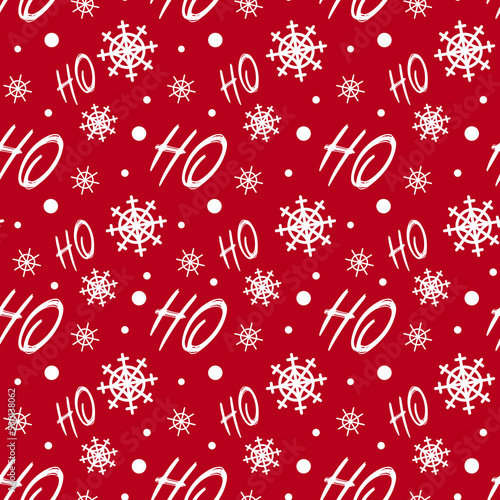 Bright Christmas pattern. White snowflakes, the inscription Ho-ho on a red background. New year, santa claus. For wallpaper, printing on fabric, wrapping, background.