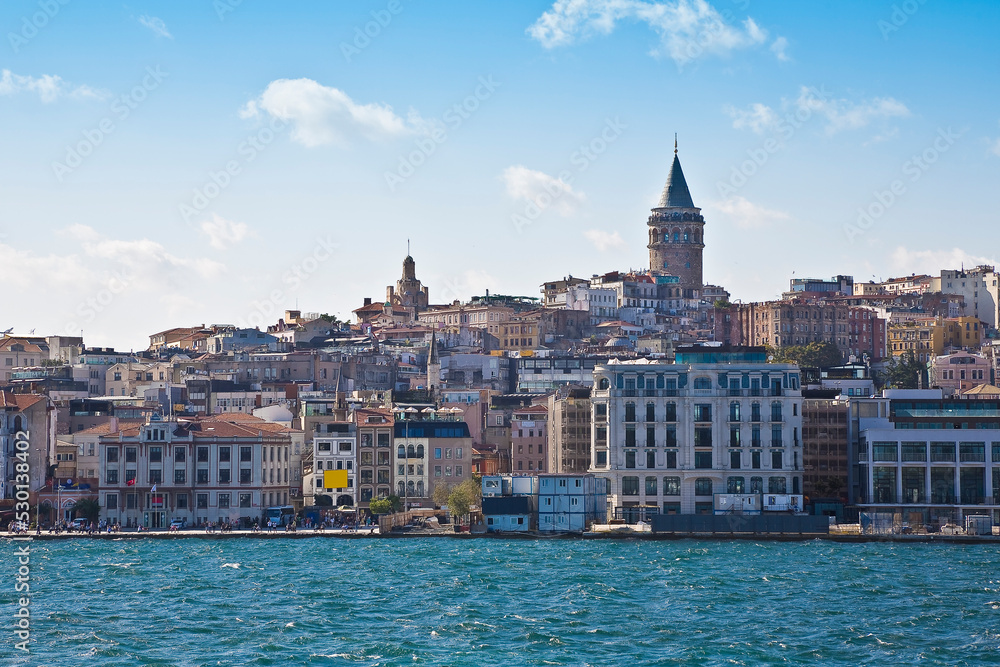 View of the famous fourteenth-century Galata Tower from the Bosphorus Strait - Istanbul - Turkey
