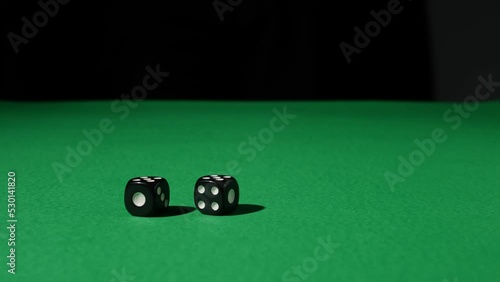 The hand throw the dice on the green game table. Two fives. Double. Twelve. Black Dice Transition, devil's bones, Dice Transition, Casino dice, Falling Dice