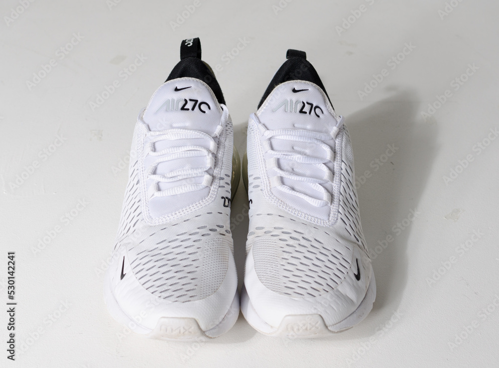 london, uk 05.08.2020 Nike Air Max 270 white low weight running trainers. Nike  air contemporary sneaker trainers. Nike sport and street wear fashionable  athletic apparel. Isolated nikes. Stock Photo | Adobe Stock