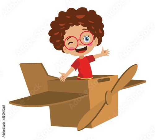 children having fun playing with a toy airplane made from cardboard boxes