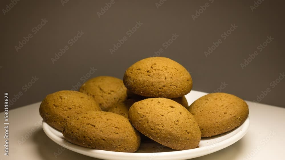 Plate full of tasty oatmeal cookies quickly becomes empty. Appetizing stop motion video Plate full of tasty oatmeal cookies quickly becomes empty. Appetizing stop motion video