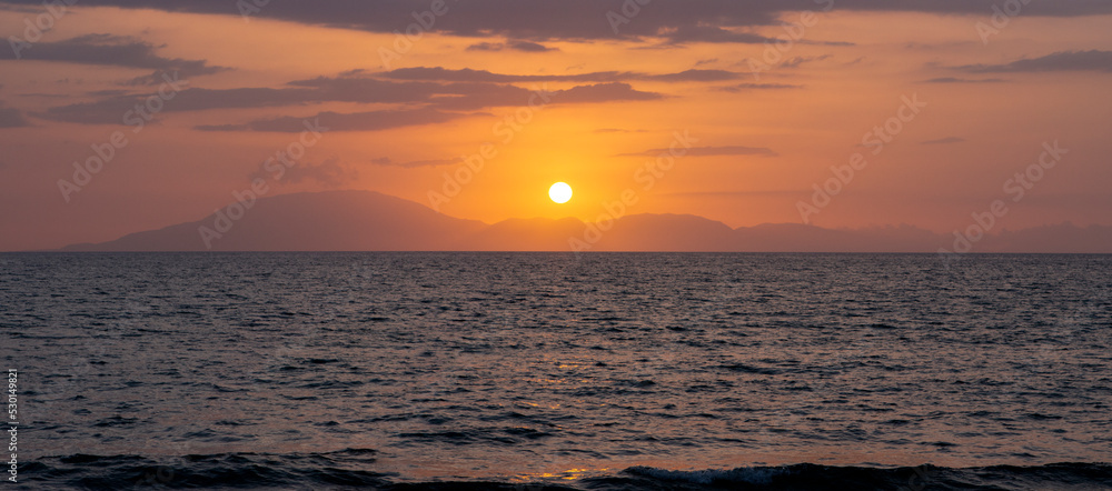 sunset over the sea. selective focus. panoramic view. summer in Greece