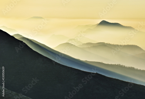 Predawn time in the highlands. mountain silhouettes in the fog. Nature of Ukraine