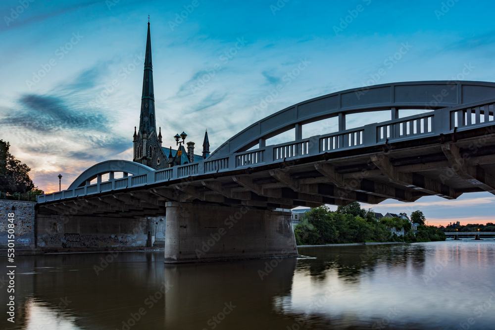 The Main Street Bridge and the Central Presbyterian Church along the Grand River at the beautiful town of Cambridge, Ontario, Canada--at blue hour.