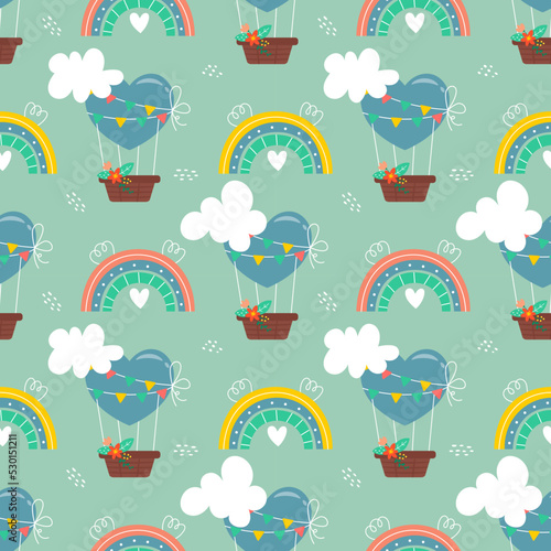 Seamless pattern with heart shaped balloons. Creative children's hand drawn texture for fabric, packaging, textiles, wallpaper, clothing. Hot air balloon and rainbow in clouds on green background.
