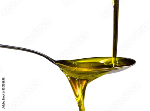 organic olive oil poured into the spoon