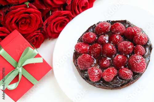 berry dessert. chocolate cheesecake with raspberries and jell photo