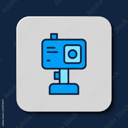 Filled outline Action extreme camera icon isolated on blue background. Video camera equipment for filming extreme sports. Vector