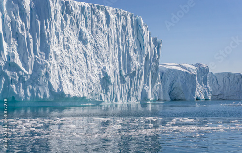 Towering great icebergs in the Ilulissat Icefjord in Greenland © Nigel