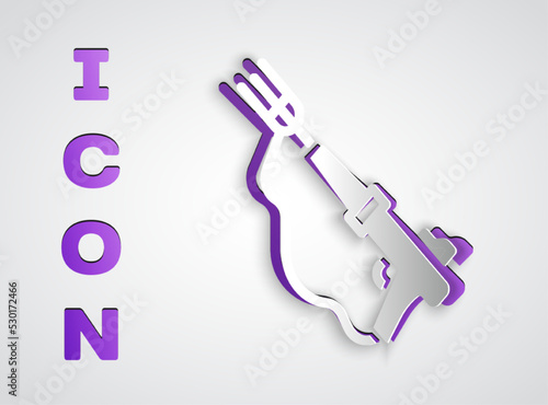 Paper cut Fishing harpoon icon isolated on grey background. Fishery manufacturers for catching fish under water. Diving underwater equipment. Paper art style. Vector