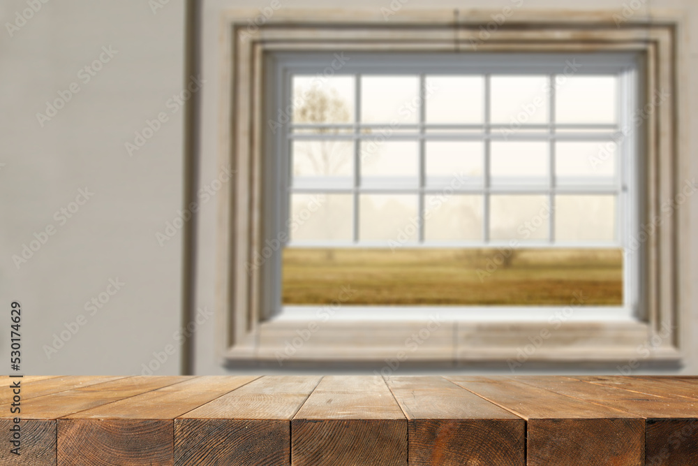 Fototapeta premium Desk of free space and autumn window background. 