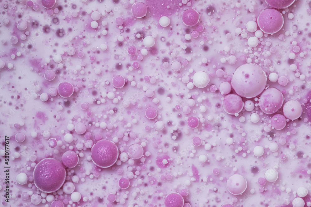 Top view pink oil bubbles abstract texture. Multicolored surface Top view pink oil bubbles abstract texture. Multicolored surface