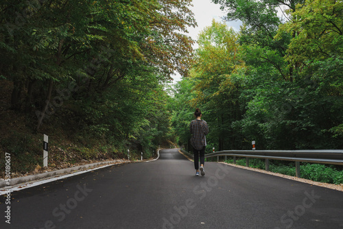 Wallpaper Mural beautiful girl walks in the forest near the road Torontodigital.ca