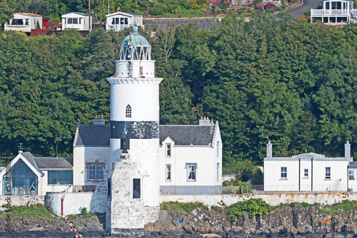 The Cloch Lighthouse is located on Cloch Point, three miles south west of Gourock, on the east shore of the Firth of Clyde, directly opposite Dunoon. photo