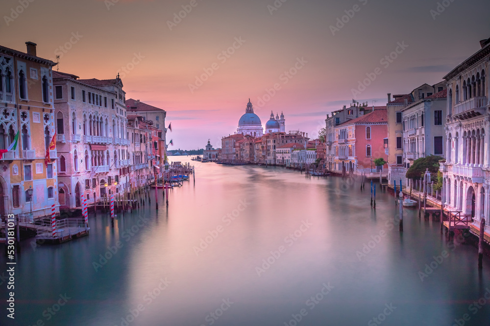 Grand Canal in Venice at sunrise, with Santa Maria della Salute Basilica, Italy