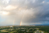 A double rainbow appears over the city of Thunder Bay, Ontario, as seen from Mount McKay Lookout.
