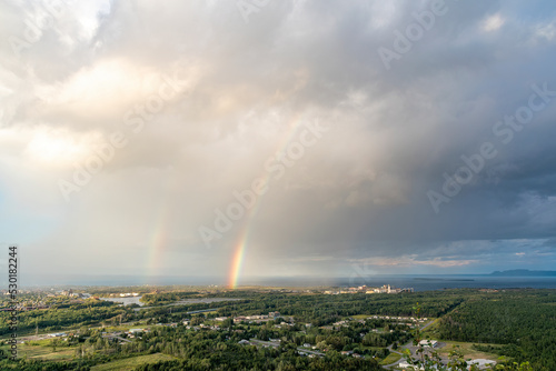 A double rainbow appears over the city of Thunder Bay  Ontario  as seen from Mount McKay Lookout.