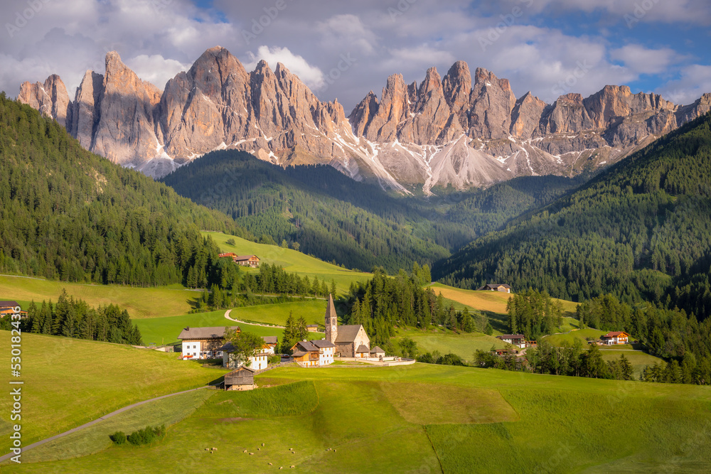 St. Magdalena with famous church in Val di Funes at sunset, Dolomites , Italy St. Magdalena with famous church in Val di Funes at sunset, Dolomites , Italy